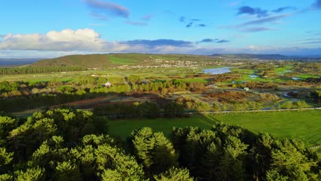 aerial taff valley wales with lush green countryside with blue sky on a sunny day