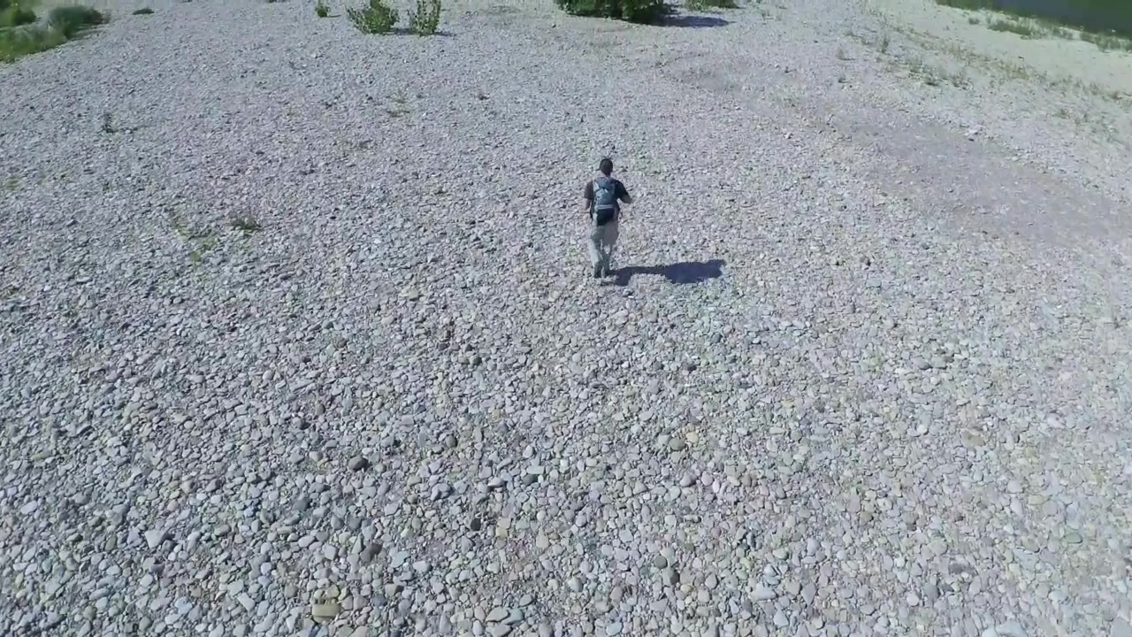 Drone shot of male hiker.