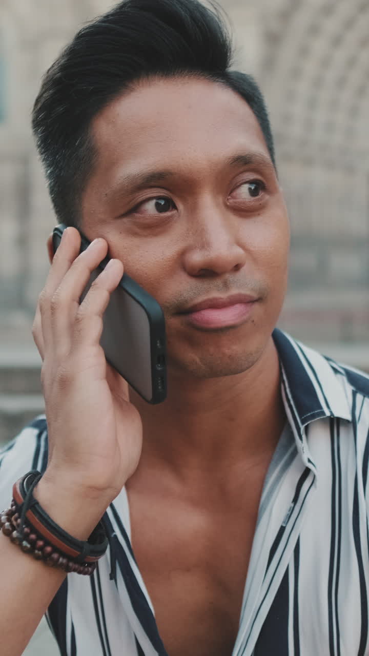 Man Talking on Phone