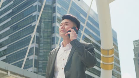 businessman on a phone call in a city