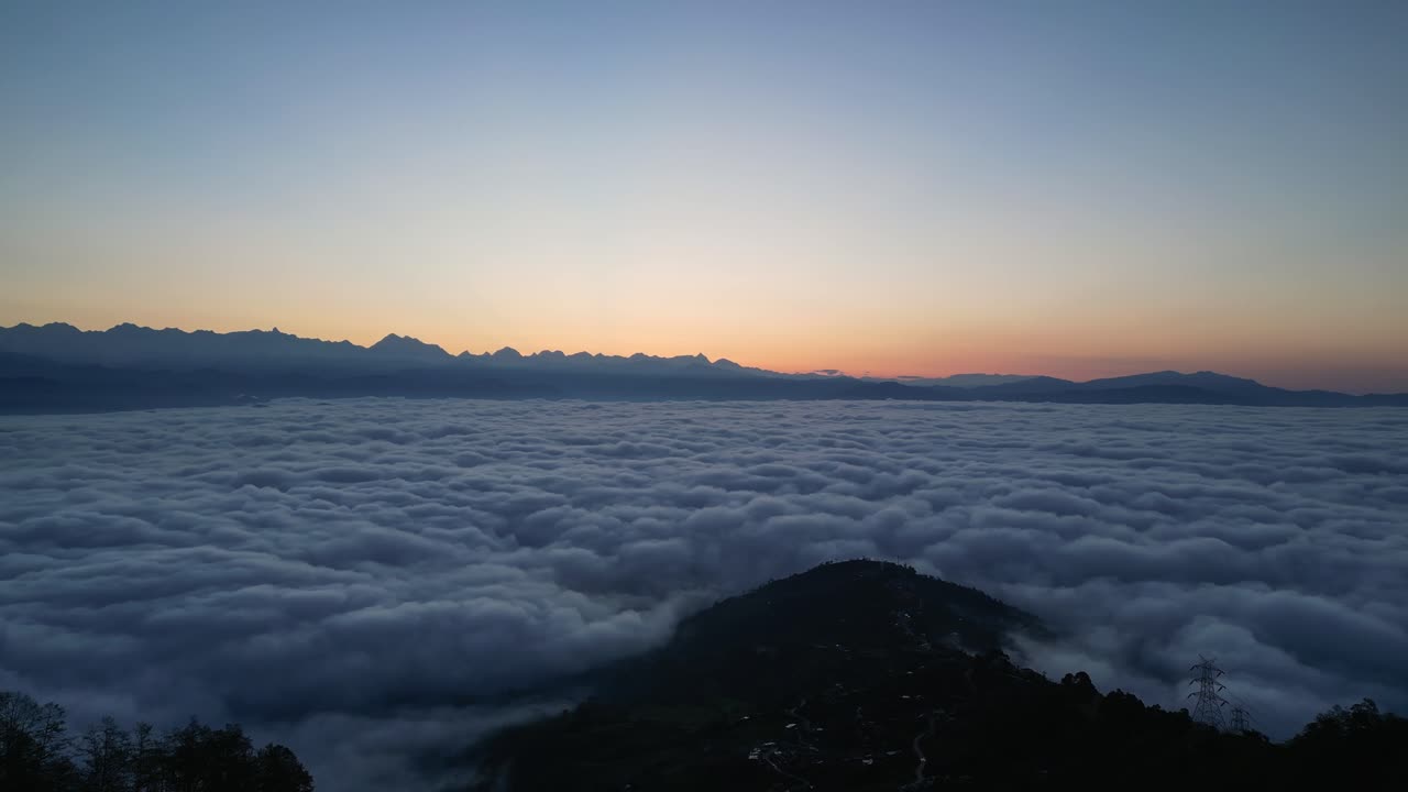 Heavenly Perspectives: Awe-Inspiring Drone View of Mountains Amidst the Clouds (High-Res Footage)