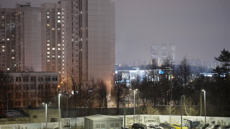 night view of city apartments and high-rise buildings in winter