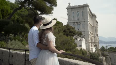 couple enjoying the view of the oceanographic museum in monaco