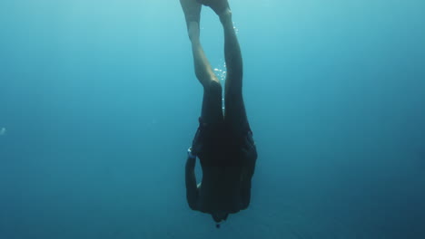 man snorkeling in the ocean