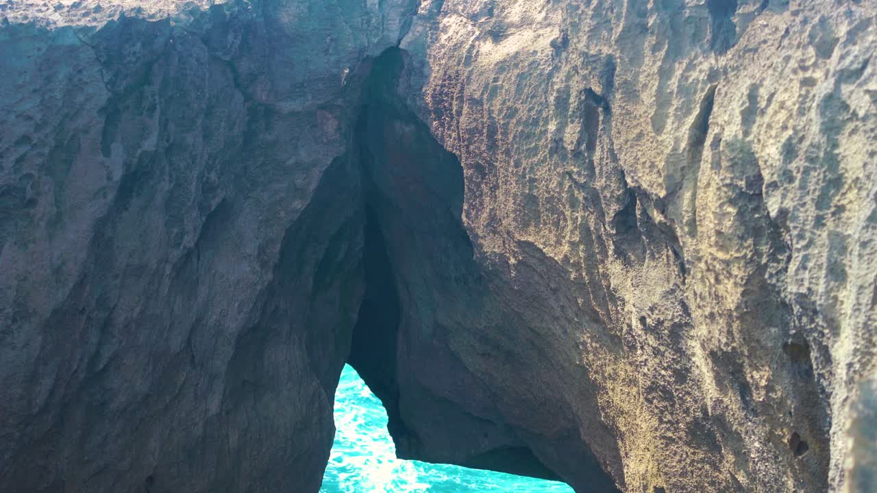 Popular Natural Pools With Limestone Cliffs In Mar Chiquita Beach, Puerto Rico. Tracking Shot