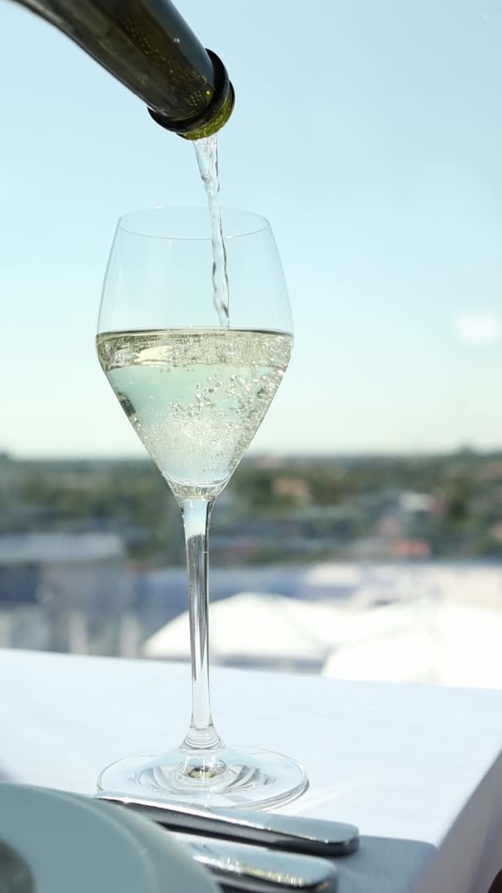 Pouring wine into a glass