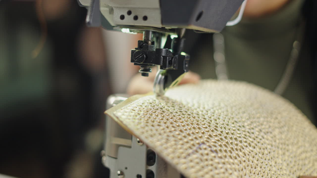 Sewing machine working on patterned fabric