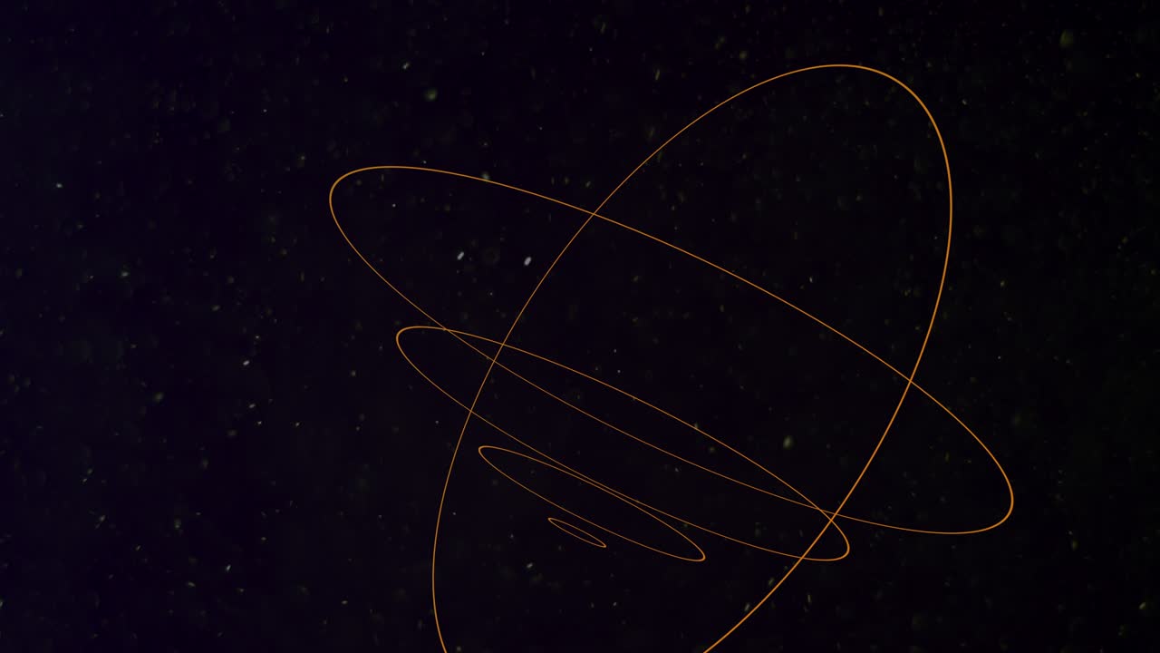 Yellow neon abstract spiral circles in space with fly glitters