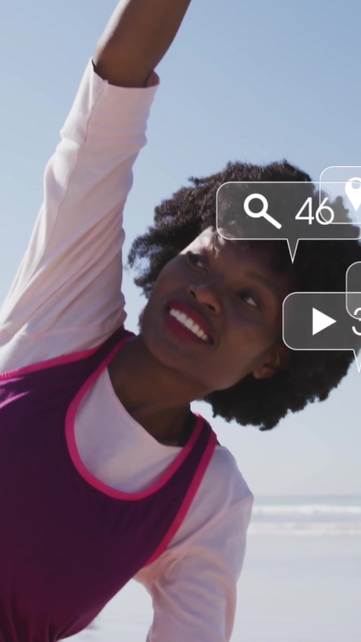 Animation of social media data processing over african american woman stretching on beach