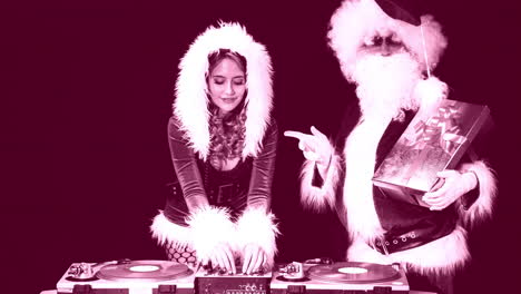 woman in xmas costume djing for christmas time disco shoot