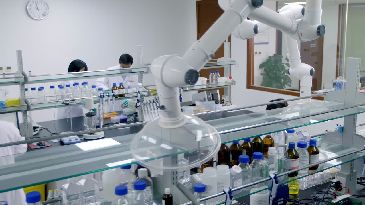 Scientist team conducting biological experiment on Cell culture essay with high tech, test tubes, chemical liquid. Forensic exam in lab, innovation in medicine for detection of antibodies, infections