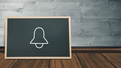 animation of a white bell icon flickering on a pictogram of a blackboard on a wooden floor