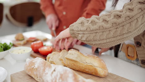 couple preparing a sandwich