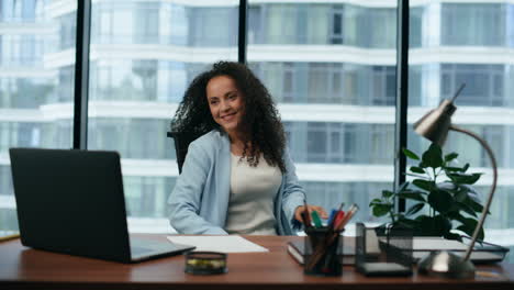 excited businesswoman reading good news on laptop sitting modern office close up