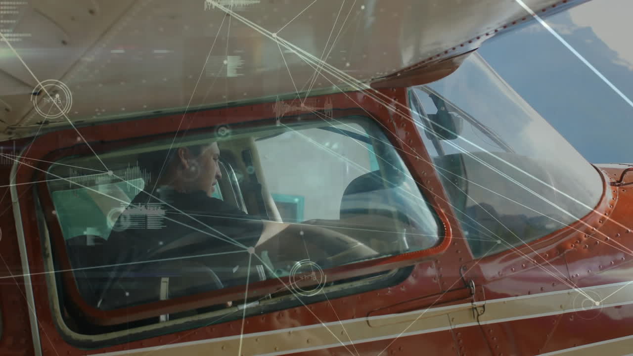 데이터 처리 애니메이션이 여있는 소형 항공기를 조종하는 조종사