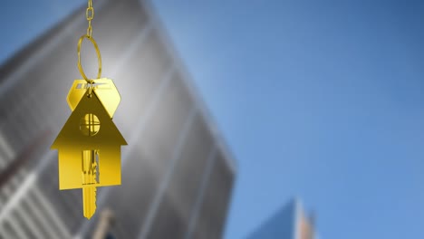 animation of golden house keys against blurred view of tall buildings