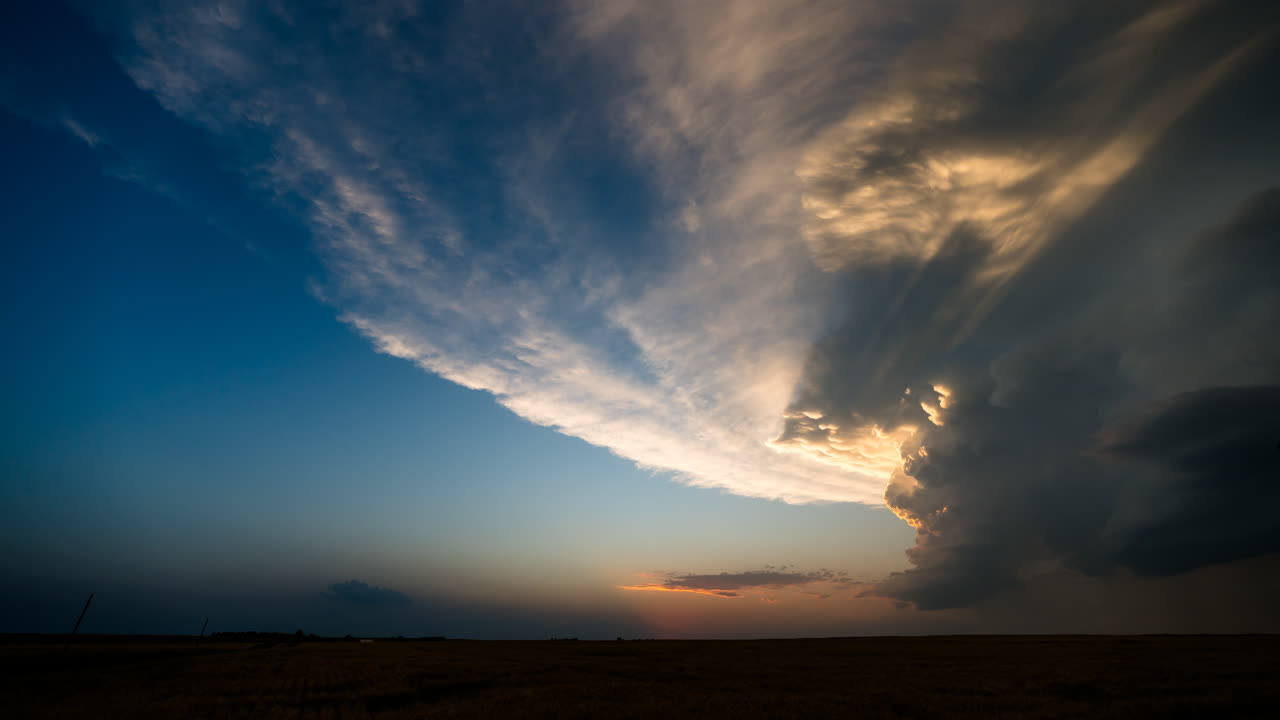 Dramatic Sunset Storm Clouds over a Field