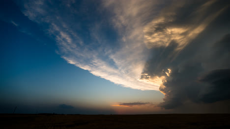 dramatic sunset storm clouds over a field