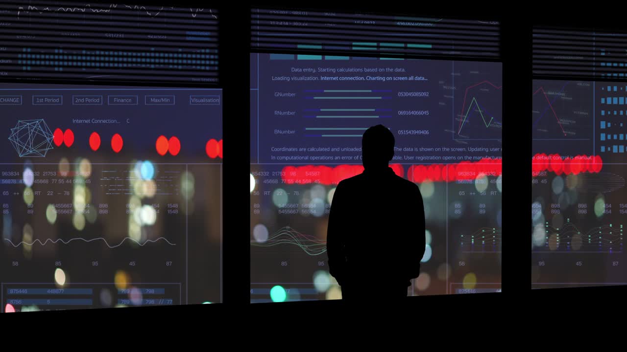 The man stands near the window on the holographic background