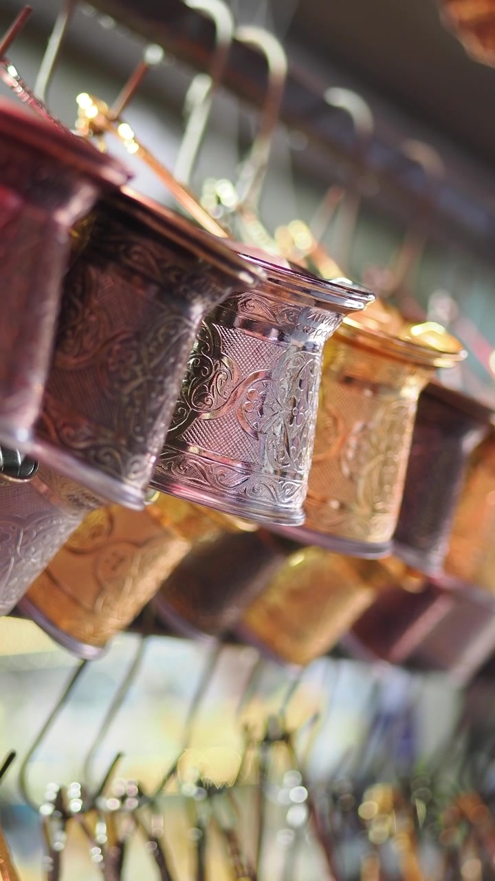 Traditional Turkish Coffee Pots Hanging in a Market Stall