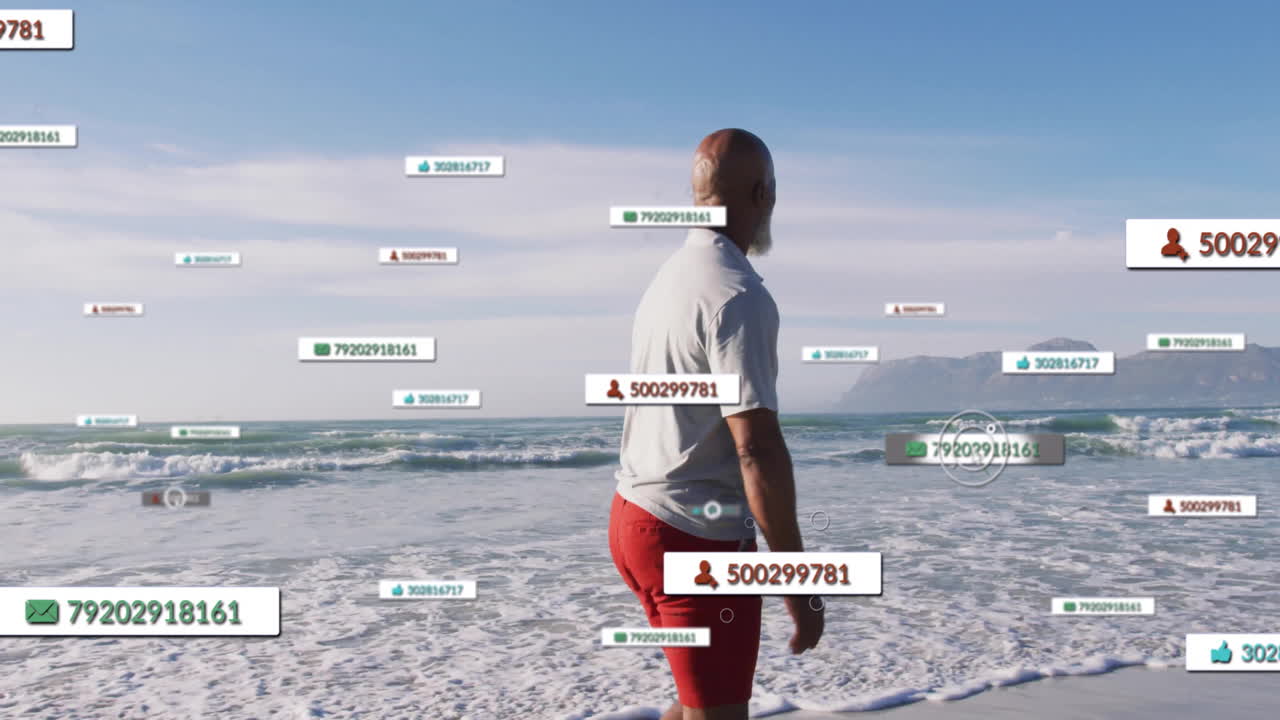 Man standing gazing toward horizon on beach with floating social media analytics counters hovering