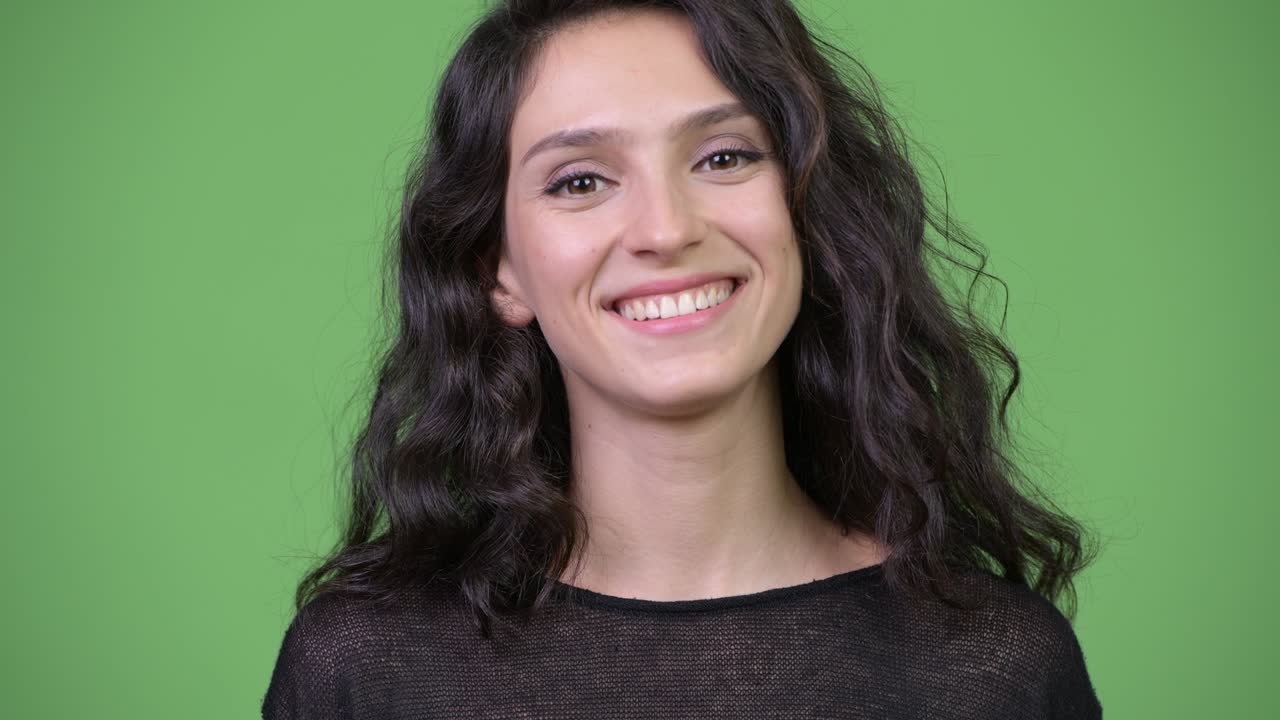 Young happy beautiful woman smiling