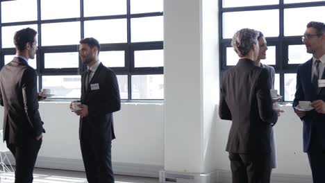 business people drinking coffee