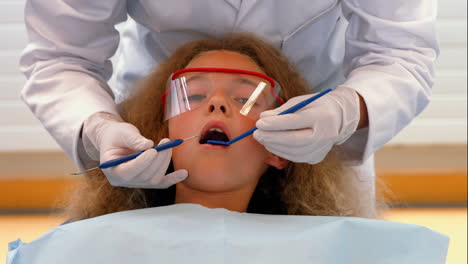 dentist examining a patients teeth