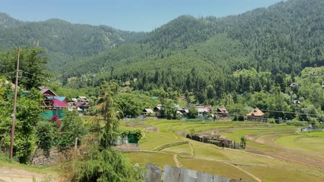 beauty of rural india and farmers land, nature beauty, hills, green fields with village life in forest area and timeless travel escapes