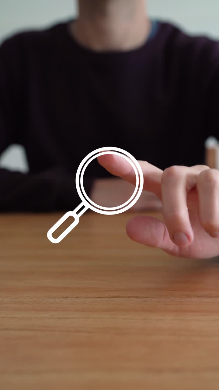 Vertical View Of A Man Using A Laptop Computer Searching Icon. Selective Focus Shot