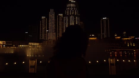 Girl-in-front-of-a-fountain-in-Dubai