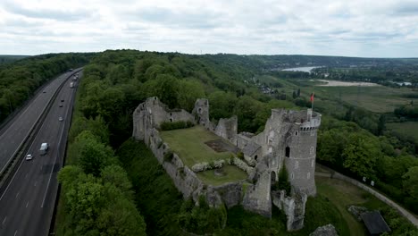 Aerial-View-of-Normandy-France-Castle-by-A13-Freeway-with-Seine-River-in-Background