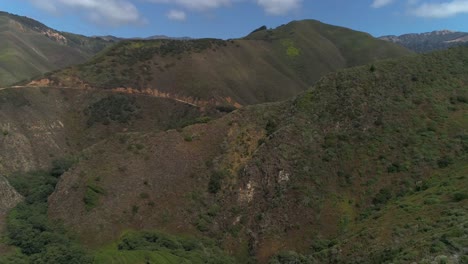 Aerial-Drone-Stock-Video-of-Bixby-Bridge-Highway-with-water-and-shore-below-in-Big-Sur-Monterrey-California