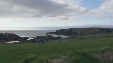 lawn mower left in coastal grass