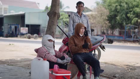 workers taking a break on the street