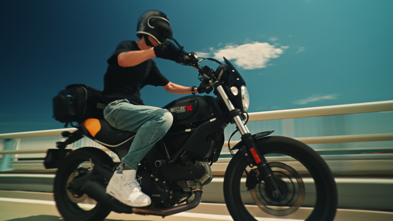 Motorcycle Rider on Bridge