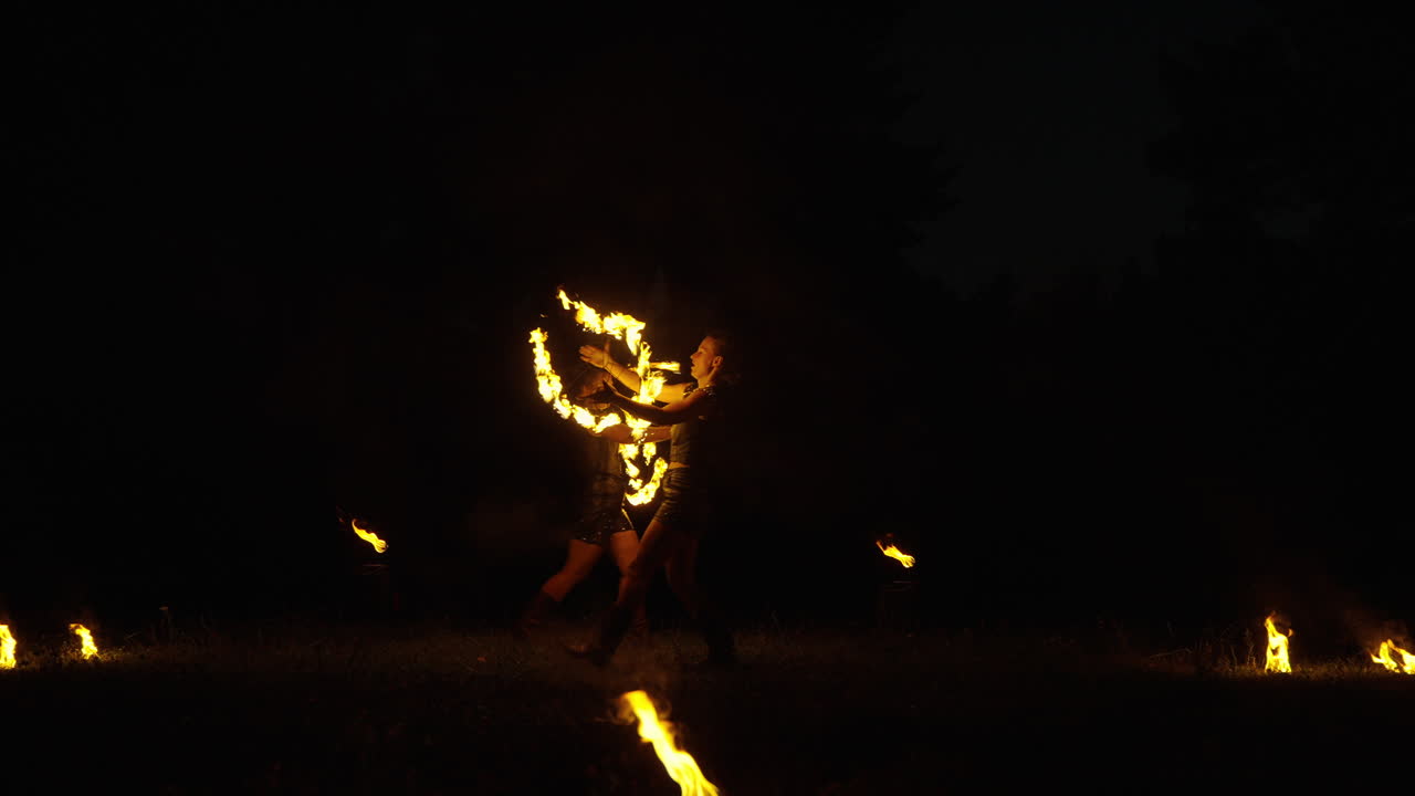 Fire Dancers at Night