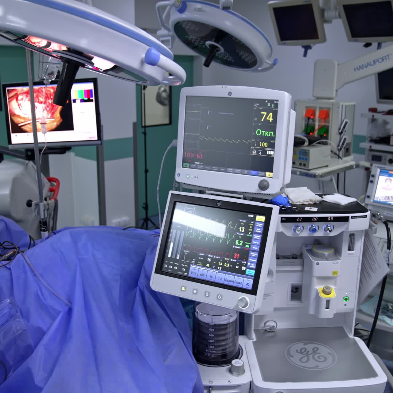 Technologically equipped surgery room with diverse advanced machines. Team of surgeons carrying out neurosurgical operation
