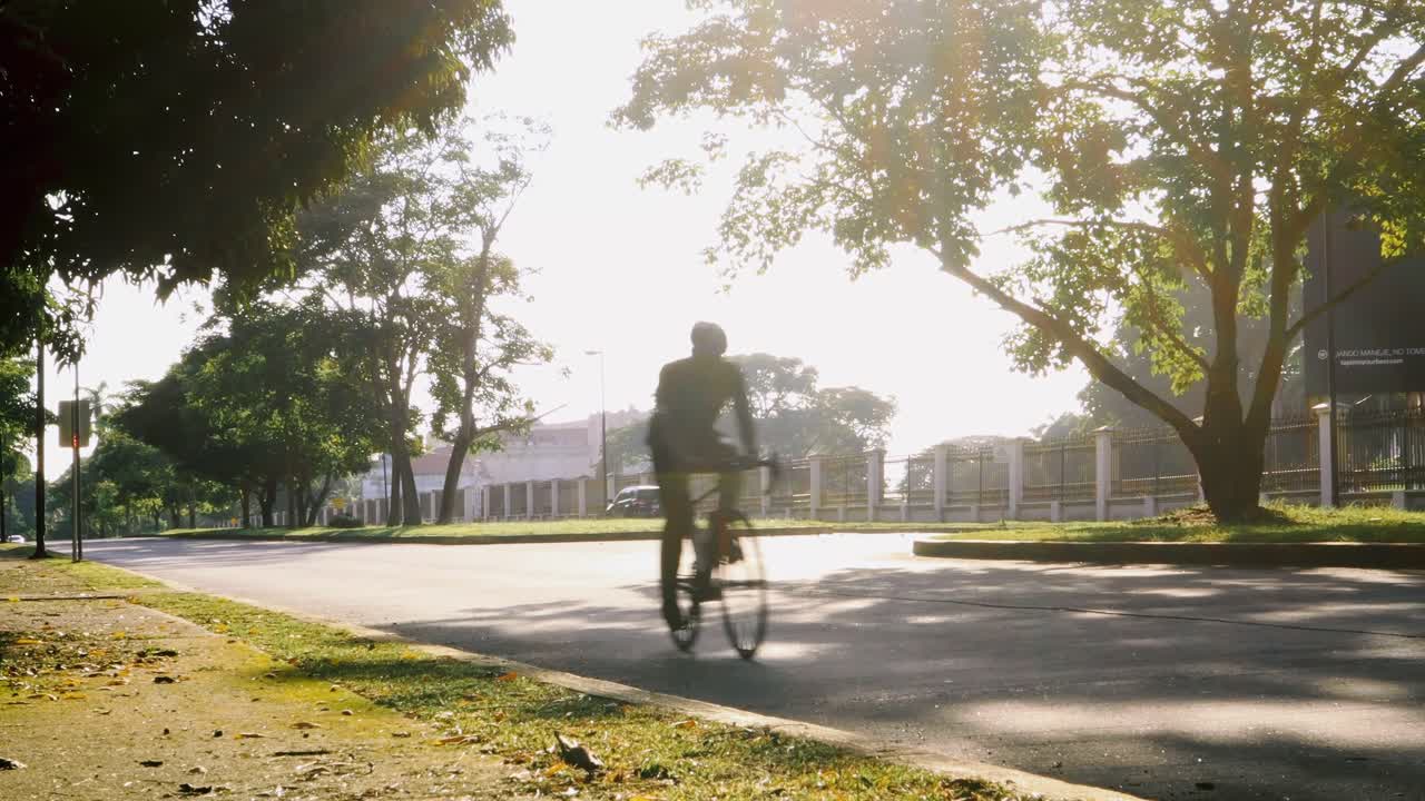 Morning cyclist on a scenic road