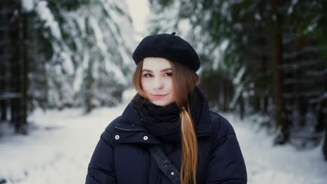 young beautiful woman smiling despite the cold