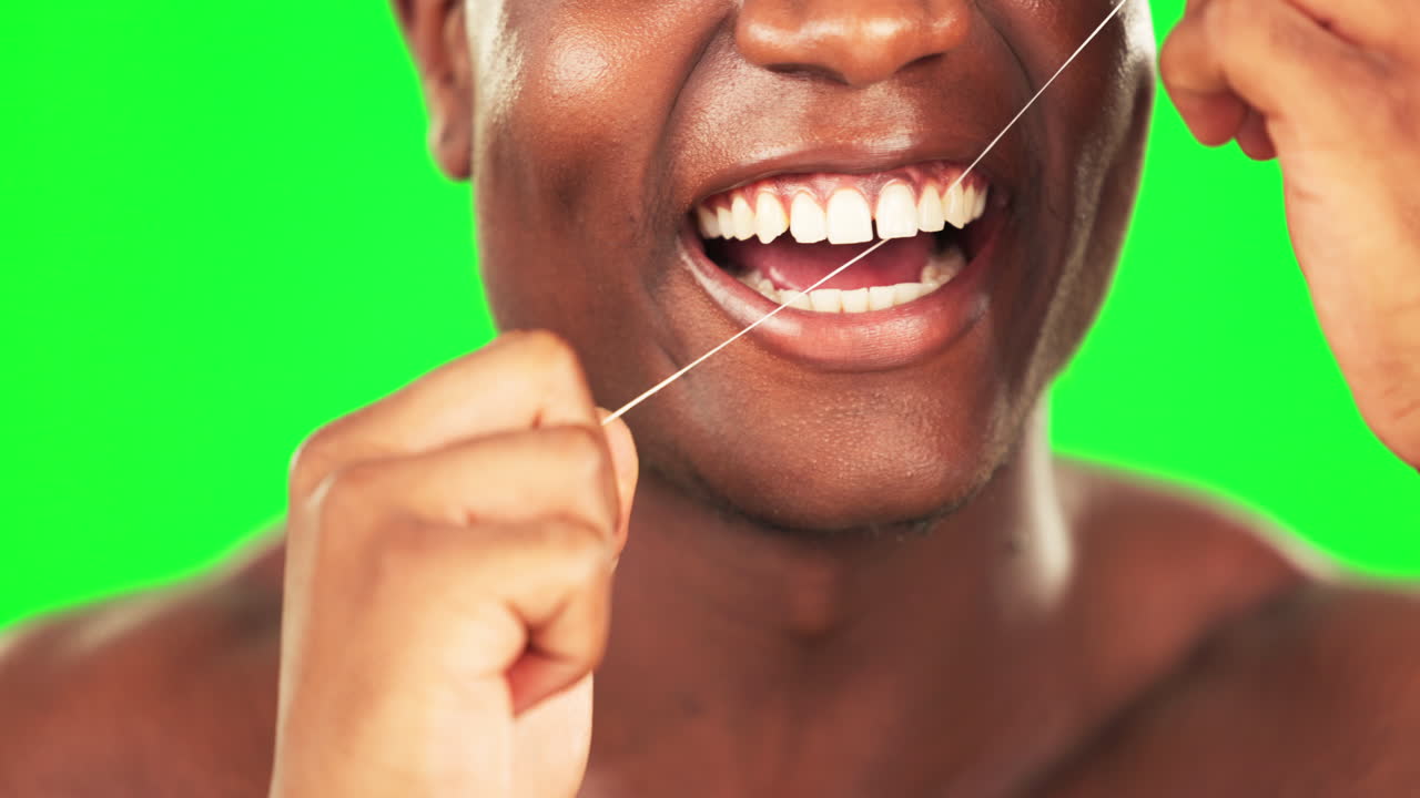 Black man, mouth and flossing