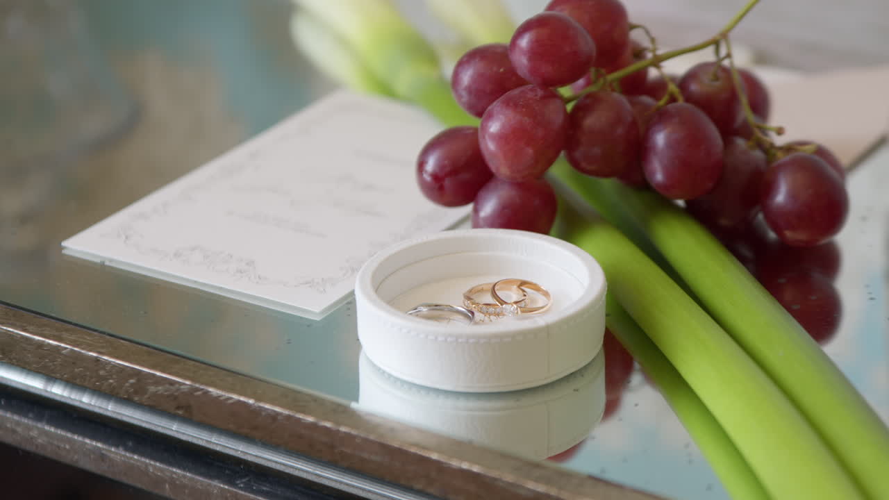 VOV and golden wedding ring being picked up by bridge, close up