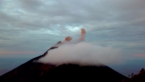 beautiful aerial perspective over an active volcano in guatemala