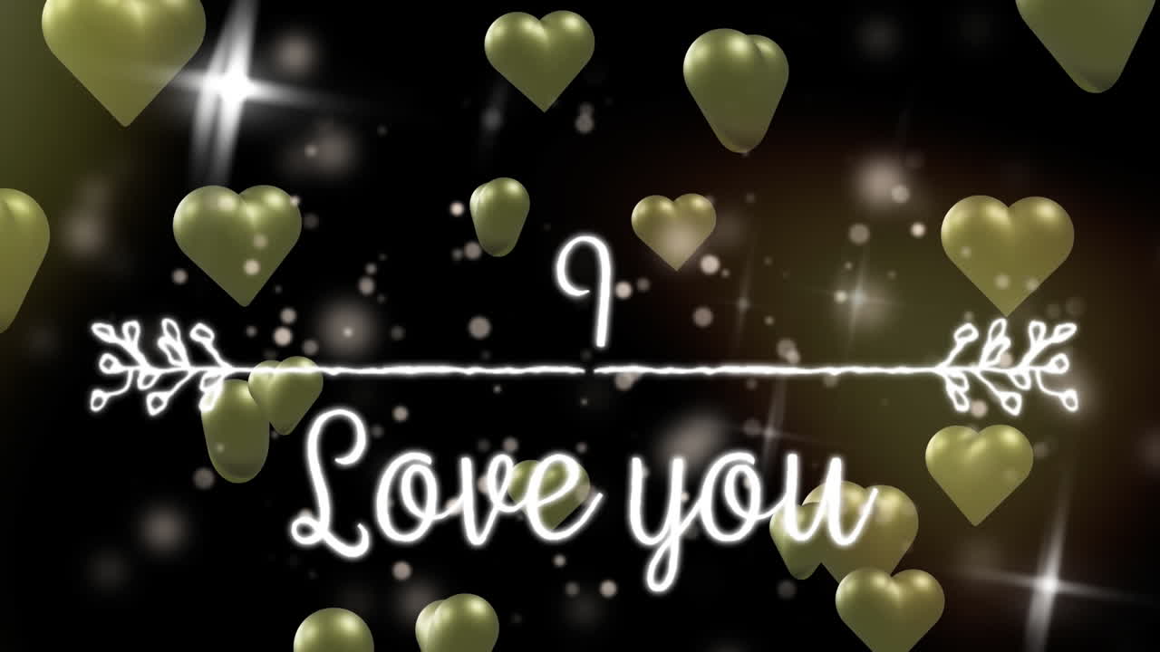 'i love you'의 애니메이션은 검은색 배경에 금색 심장과 밝은 반점 위에 텍스트를 표시합니다.