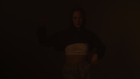 stylish woman in cropped hoodie