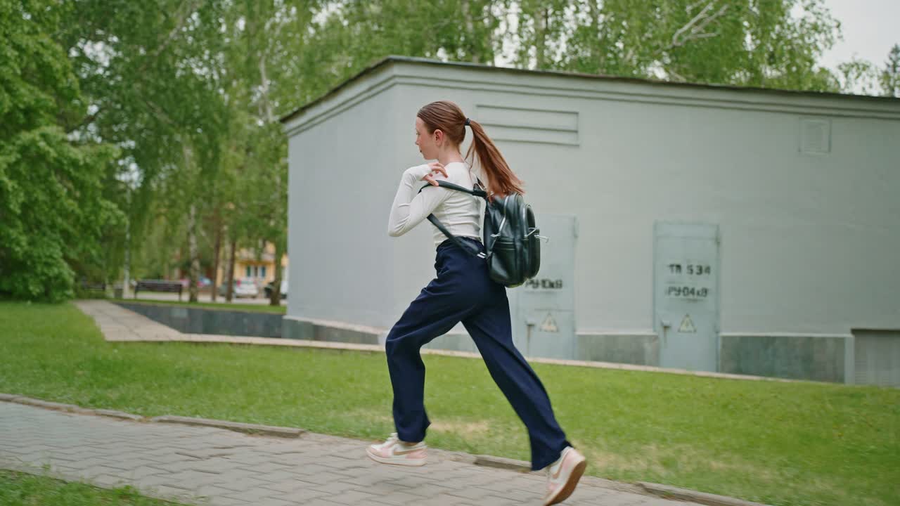 Teenager Running in a Park