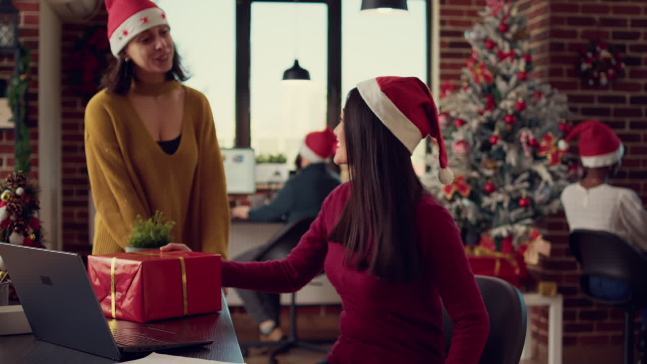 Diverse people exchanging presents during winter holiday season