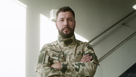 beard man posing indoors