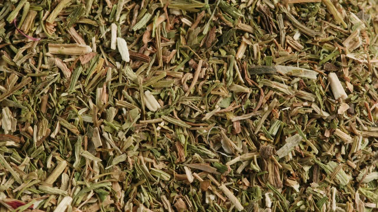 Close-up of Dried Green Herbs and Spices Texture
