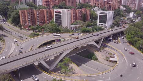 aerial slow tilting shot revealing glorieta aguacatala in medellin